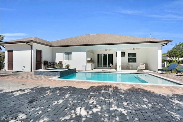 1806 41st St SW, Naples, FL 34116 - rear view of property with ceiling fan, a patio, stucco siding, and a pool with connected hot tub
