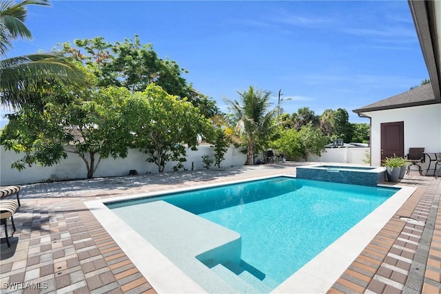 1806 41st St SW, Naples, FL 34116 - view of swimming pool featuring a patio, a fenced backyard, and a pool with connected hot tub