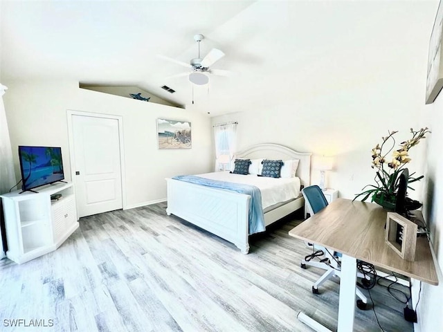 1958 Terrazzo Ln, Naples, FL 34104 - bedroom with vaulted ceiling, wood finished floors, an office area, and a ceiling fan
