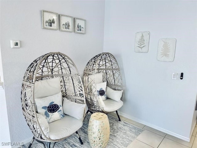 1958 Terrazzo Ln, Naples, FL 34104 - living area featuring baseboards and tile patterned flooring