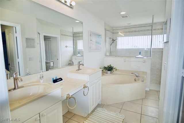 1958 Terrazzo Ln, Naples, FL 34104 - full bath with double vanity, tile patterned floors, a garden tub, and tiled shower