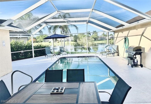 1958 Terrazzo Ln, Naples, FL 34104 - outdoor pool featuring a patio, a grill, a water view, and a lanai
