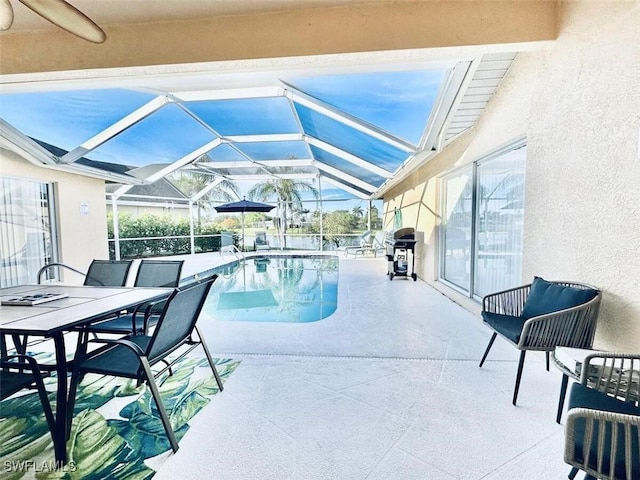 1958 Terrazzo Ln, Naples, FL 34104 - view of swimming pool featuring a patio area, area for grilling, a lanai, and outdoor dining space