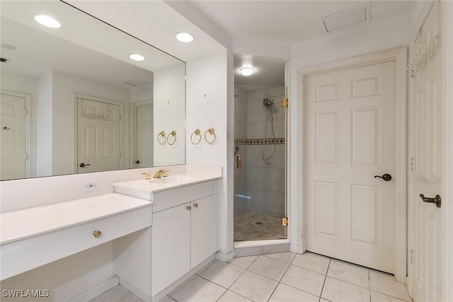 420 Cove Tower Dr Unit 304, Naples, FL 34110 - full bath featuring vanity, tile patterned flooring, a shower stall, and recessed lighting