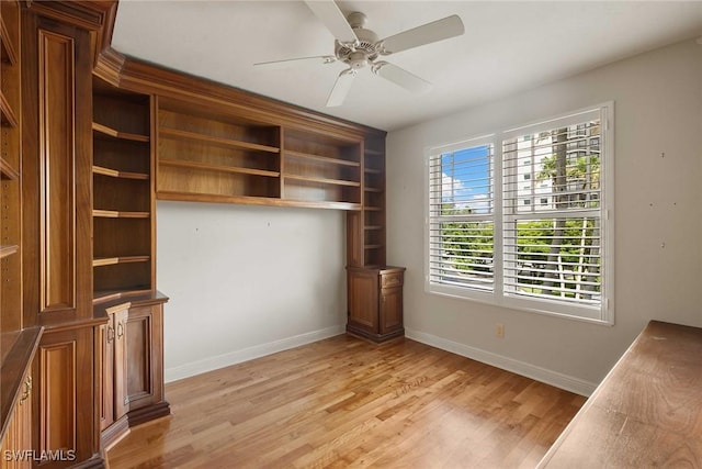 420 Cove Tower Dr Unit 304, Naples, FL 34110 - unfurnished office featuring light wood-style flooring and ceiling fan