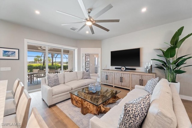 9245 Independence Way, Fort Myers, FL 33913 - living area with a ceiling fan, light wood-style flooring, and recessed lighting