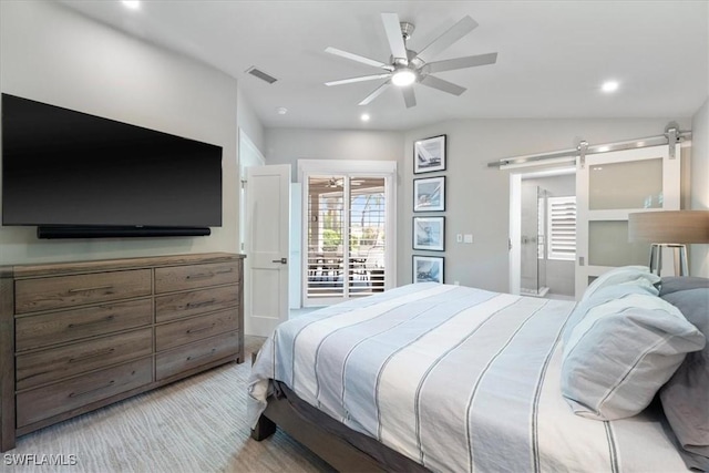 9245 Independence Way, Fort Myers, FL 33913 - bedroom with a barn door, recessed lighting, ceiling fan, vaulted ceiling, and ensuite bathroom