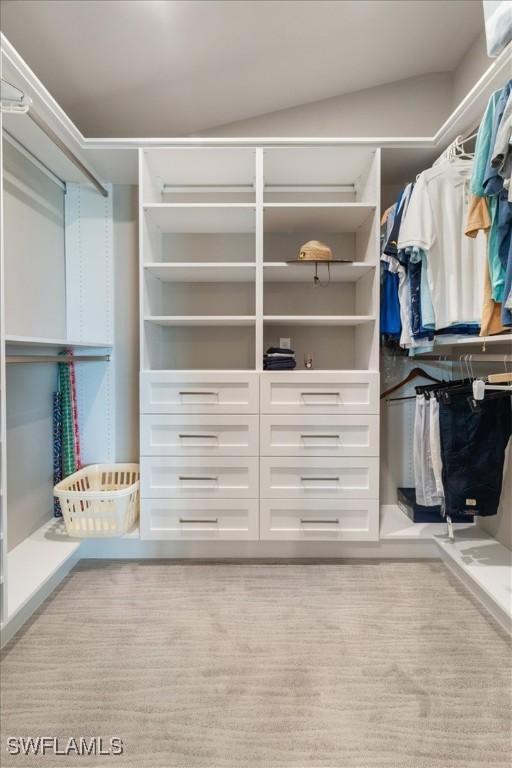 9245 Independence Way, Fort Myers, FL 33913 - walk in closet with wood finished floors