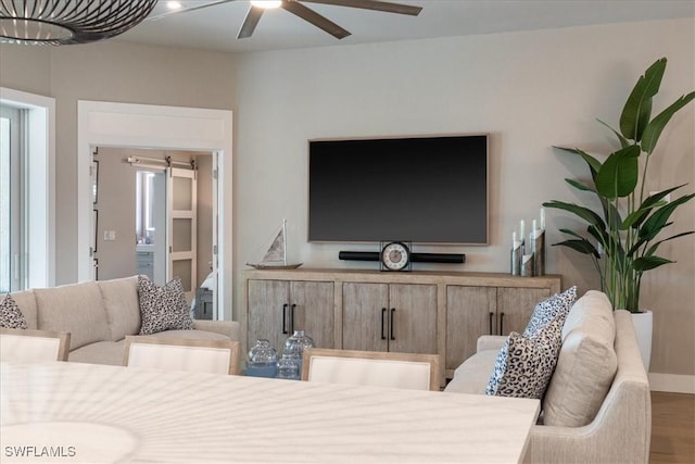 9245 Independence Way, Fort Myers, FL 33913 - living area with a ceiling fan and wood finished floors