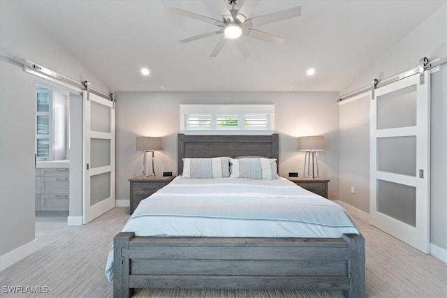 9245 Independence Way, Fort Myers, FL 33913 - bedroom featuring a barn door, recessed lighting, ceiling fan, and wood finished floors