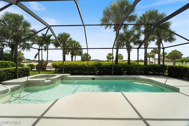 9245 Independence Way, Fort Myers, FL 33913 - view of pool featuring a patio, glass enclosure, and a pool with connected hot tub