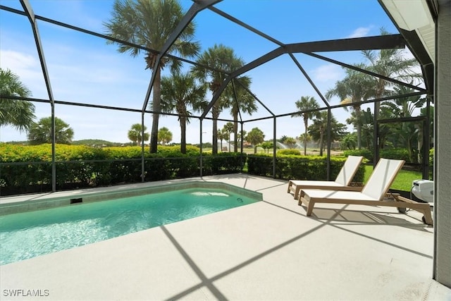 9245 Independence Way, Fort Myers, FL 33913 - outdoor pool with a patio and glass enclosure