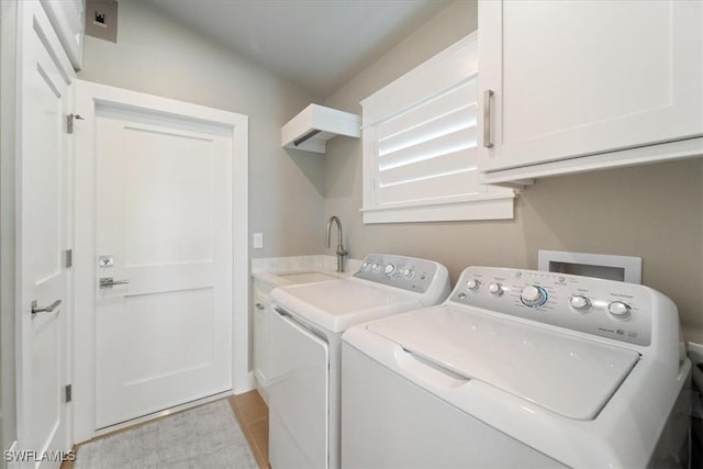 9245 Independence Way, Fort Myers, FL 33913 - washroom featuring cabinet space and washer and clothes dryer