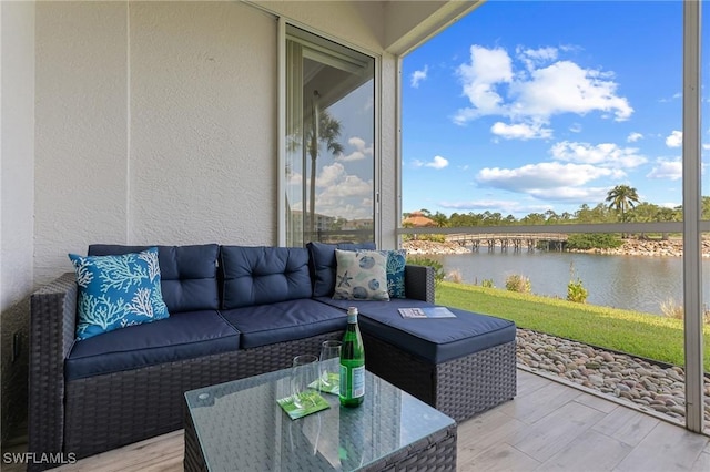 7625 Arbor Lakes Ct Unit 315, Naples, FL 34112 - sunroom / solarium with outdoor lounge area and a water view