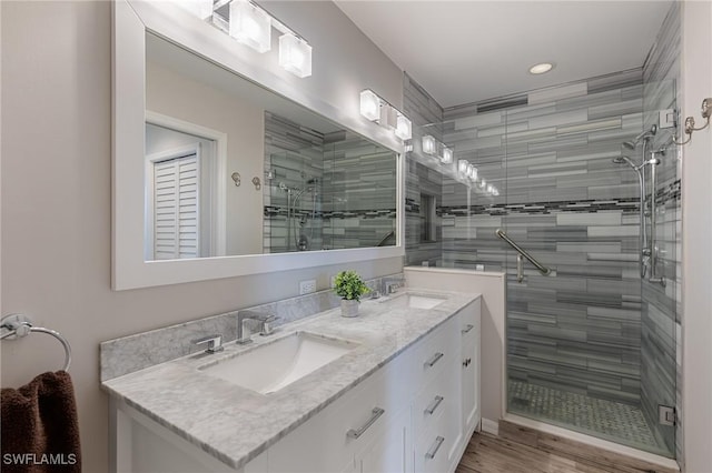 7625 Arbor Lakes Ct Unit 315, Naples, FL 34112 - full bathroom featuring double vanity, a shower stall, and recessed lighting
