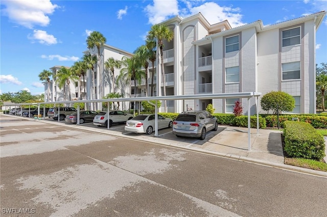 7625 Arbor Lakes Ct Unit 315, Naples, FL 34112 - view of apartment building / complex featuring covered parking