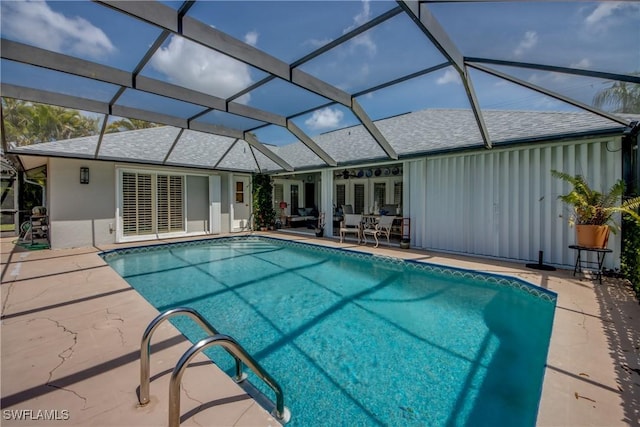 2022 Four Mile Cove Pkwy, Cape Coral, FL 33990 - swimming pool featuring a patio area, glass enclosure, and ceiling fan