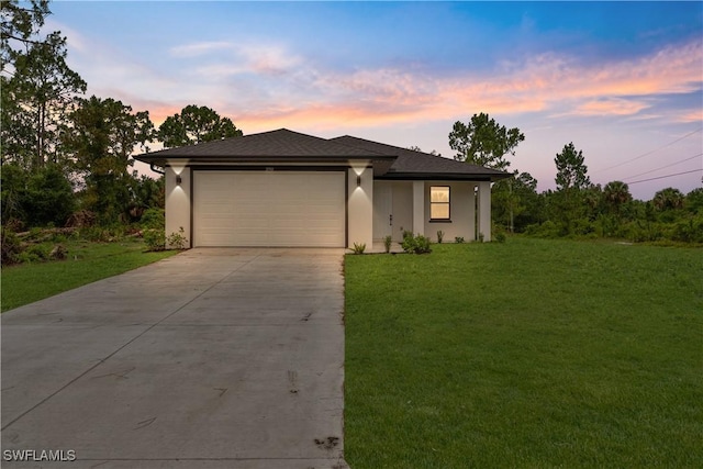 2701 53rd St W, Lehigh Acres, FL 33971 - view of front facade with concrete driveway, a front yard, and stucco siding
