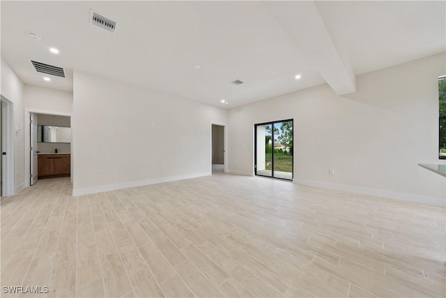 2701 53rd St W, Lehigh Acres, FL 33971 - empty room featuring light wood-type flooring and recessed lighting