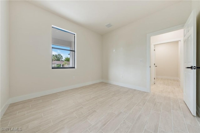 2701 53rd St W, Lehigh Acres, FL 33971 - empty room with light wood-style flooring