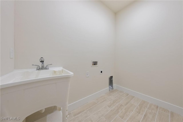 2703 54th St W, Lehigh Acres, FL 33971 - laundry area featuring hookup for a washing machine and electric dryer hookup