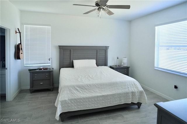 2445 Orchard St, Naples, FL 34120 - bedroom with ceiling fan and light tile patterned floors