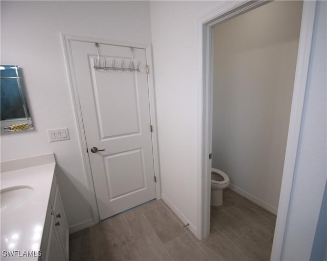 2445 Orchard St, Naples, FL 34120 - bathroom featuring vanity and toilet