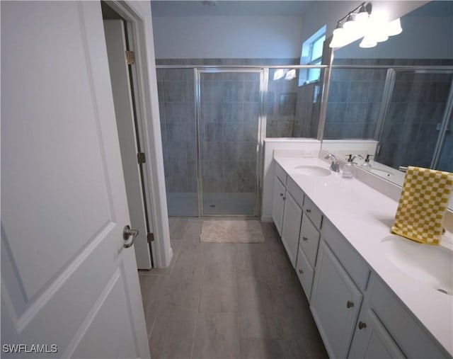 2445 Orchard St, Naples, FL 34120 - bathroom with double vanity and a shower stall