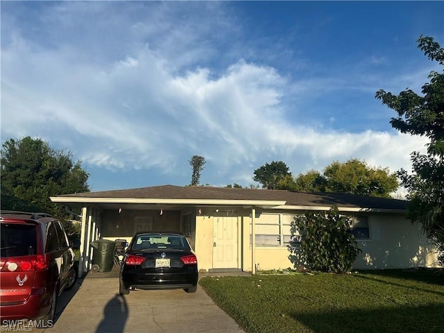 37 Castlebar Cir, Fort Myers, FL 33905 - ranch-style home with driveway, a front lawn, and an attached carport