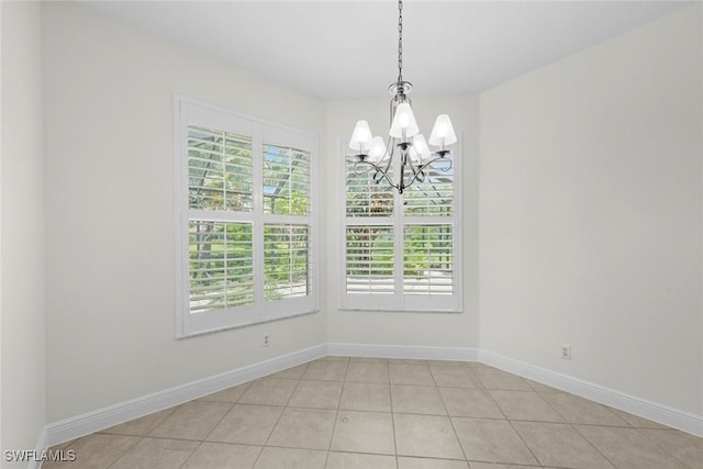 19793 Casa Verde Way, Estero, FL 33967 - unfurnished dining area featuring a chandelier and light tile patterned floors