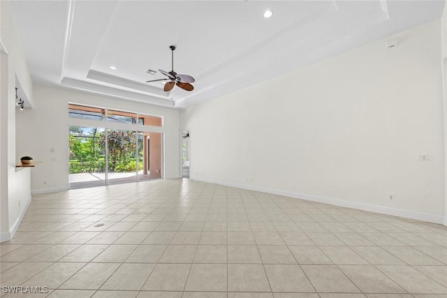 19793 Casa Verde Way, Estero, FL 33967 - spare room with a tray ceiling, a ceiling fan, light tile patterned flooring, and recessed lighting