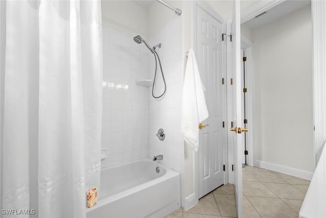 19793 Casa Verde Way, Estero, FL 33967 - bathroom featuring shower / tub combo and tile patterned flooring