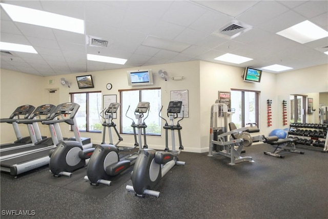 19793 Casa Verde Way, Estero, FL 33967 - workout area featuring a drop ceiling and baseboards