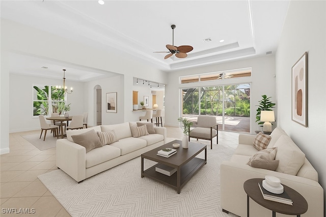 19793 Casa Verde Way, Estero, FL 33967 - living room featuring a raised ceiling, a ceiling fan, healthy amount of natural light, and recessed lighting