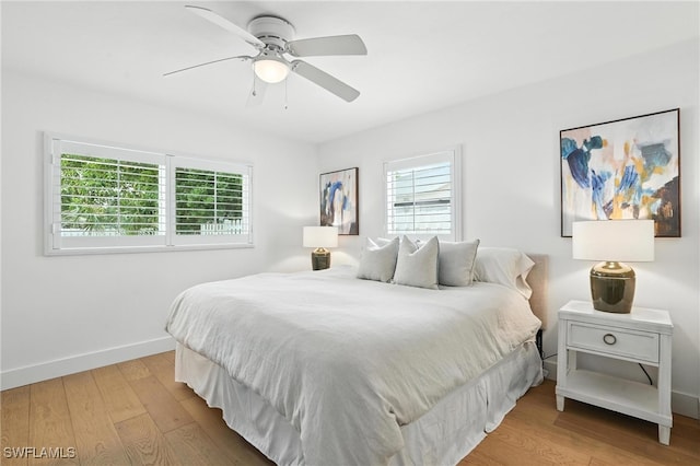 1324 Highlands Dr, Naples, FL 34103 - bedroom featuring wood finished floors and a ceiling fan