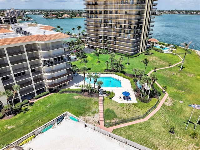 1100 N Collier Blvd Unit 920, Marco Island, FL 34145 - drone / aerial view of a pool area and a large body of water