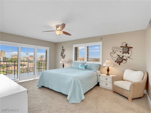 1100 N Collier Blvd Unit 920, Marco Island, FL 34145 - bedroom featuring light carpet and a ceiling fan