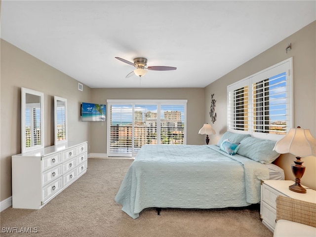 1100 N Collier Blvd Unit 920, Marco Island, FL 34145 - carpeted bedroom with baseboards and a ceiling fan