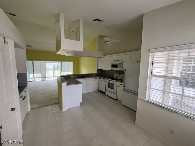 13020 Hamilton Harbour Dr Unit I3, Naples, FL 34110 - kitchen featuring white appliances, dark countertops, white cabinetry, a ceiling fan, and open floor plan