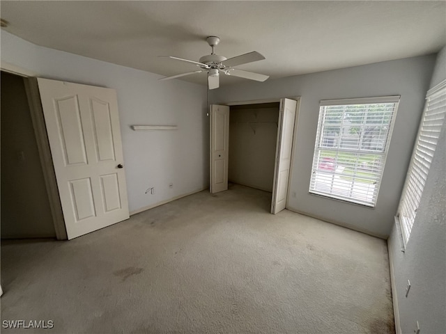 13020 Hamilton Harbour Dr Unit I3, Naples, FL 34110 - unfurnished bedroom featuring light colored carpet, a closet, and a ceiling fan