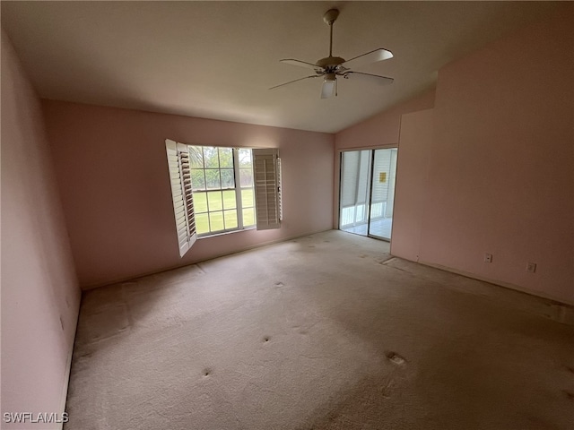 13020 Hamilton Harbour Dr Unit I3, Naples, FL 34110 - spare room with a ceiling fan, light colored carpet, and vaulted ceiling