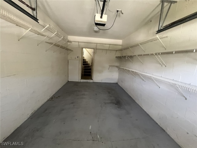 13020 Hamilton Harbour Dr Unit I3, Naples, FL 34110 - garage featuring a garage door opener