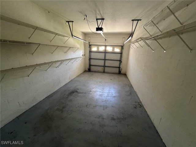 13020 Hamilton Harbour Dr Unit I3, Naples, FL 34110 - garage featuring a garage door opener