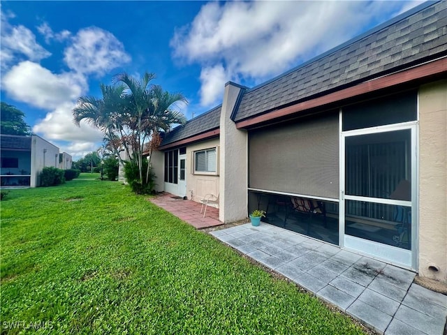 6300 S Pointe Blvd Unit 312, Fort Myers, FL 33919 - view of grassy yard with a patio area
