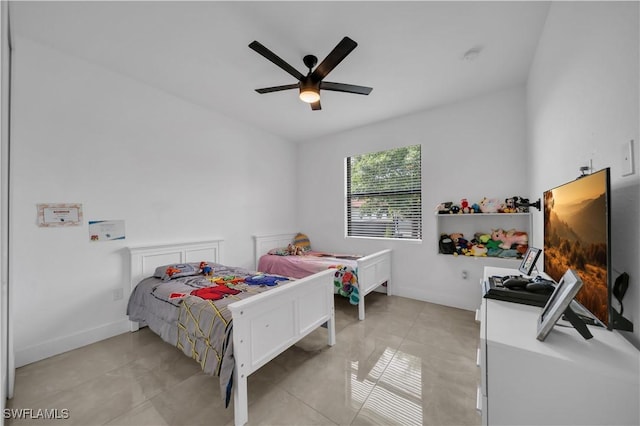 2607 4th St SW, Lehigh Acres, FL 33976 - bedroom featuring light tile patterned floors and a ceiling fan