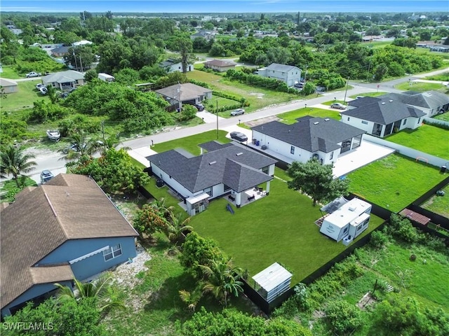 2607 4th St SW, Lehigh Acres, FL 33976 - aerial perspective of suburban area