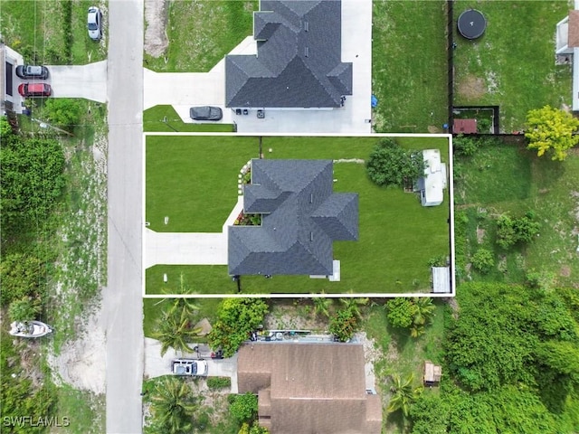 2607 4th St SW, Lehigh Acres, FL 33976 - aerial view of property's location with property parcel outlined