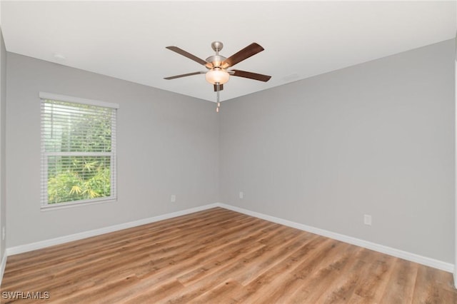 1492 Schenley St, Port Charlotte, FL 33952 - unfurnished room with ceiling fan and light wood-style flooring