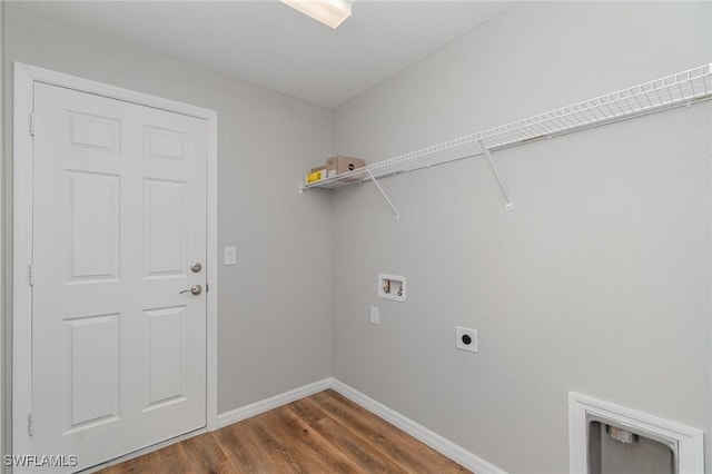 1492 Schenley St, Port Charlotte, FL 33952 - washroom with hookup for a washing machine, electric dryer hookup, and wood finished floors