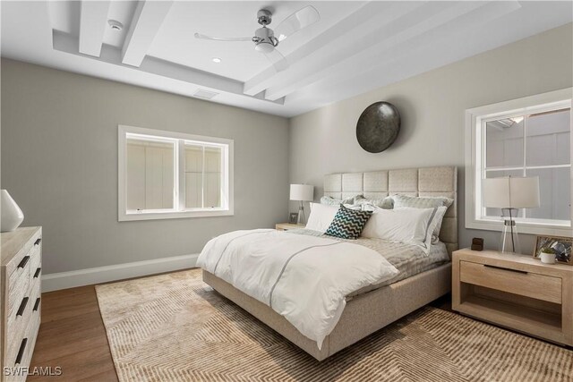 61 14th St S, Naples, FL 34102 - bedroom featuring wood finished floors and a ceiling fan
